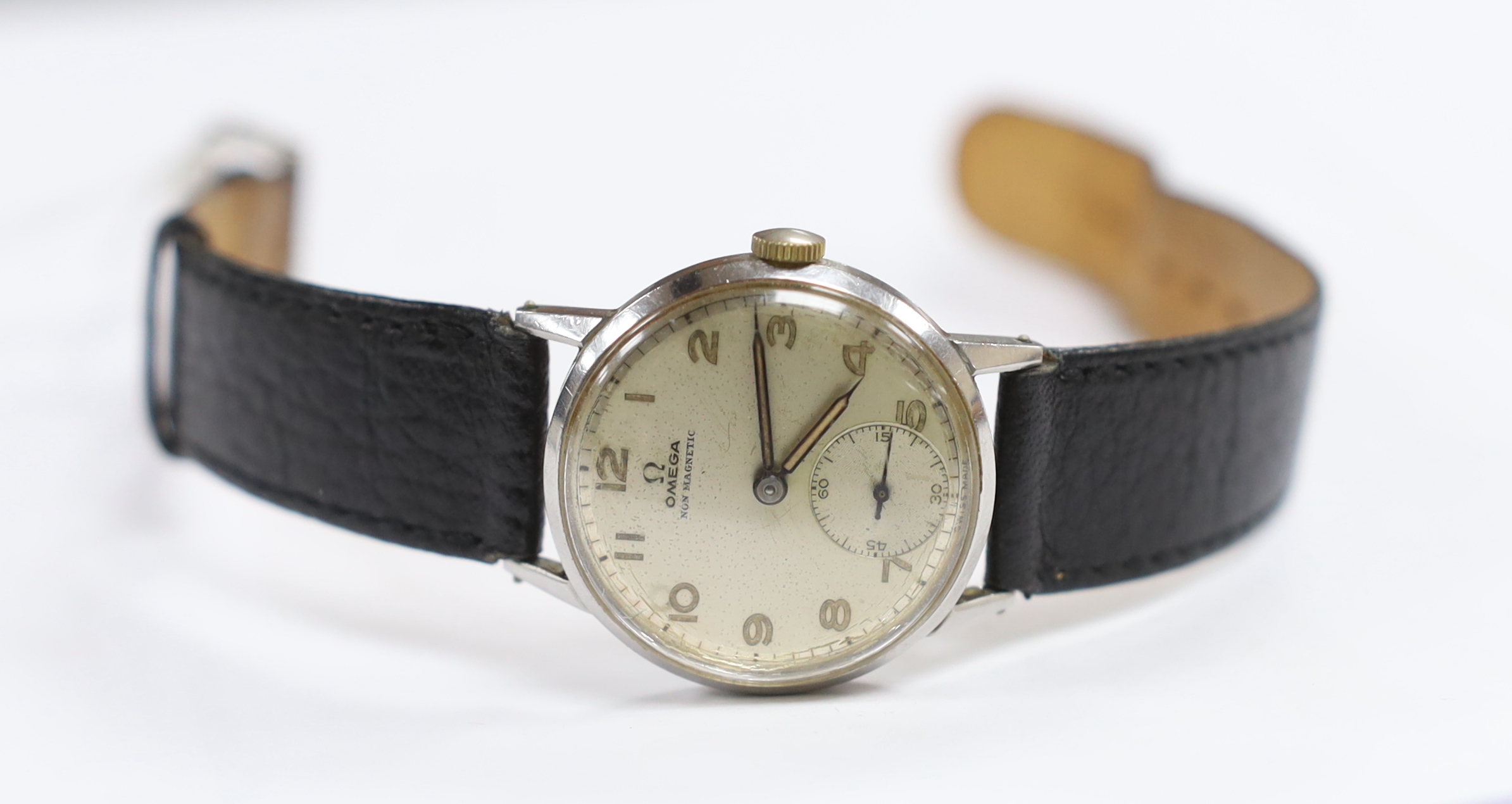 A gentleman's mid 1940's steel Omega non magnetic manual wind wrist watch, movement c.26.5 T3, case diameter 30mm, on associated leather strap.